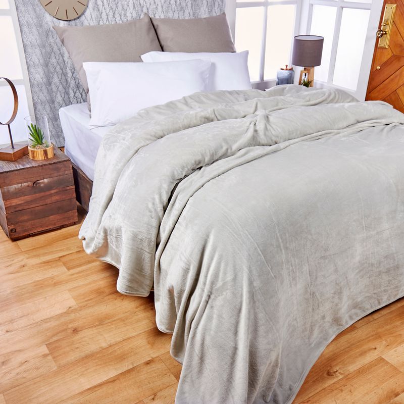 Walnut desk organizer set with white modular trays, next to porcelain mug on wooden desk.