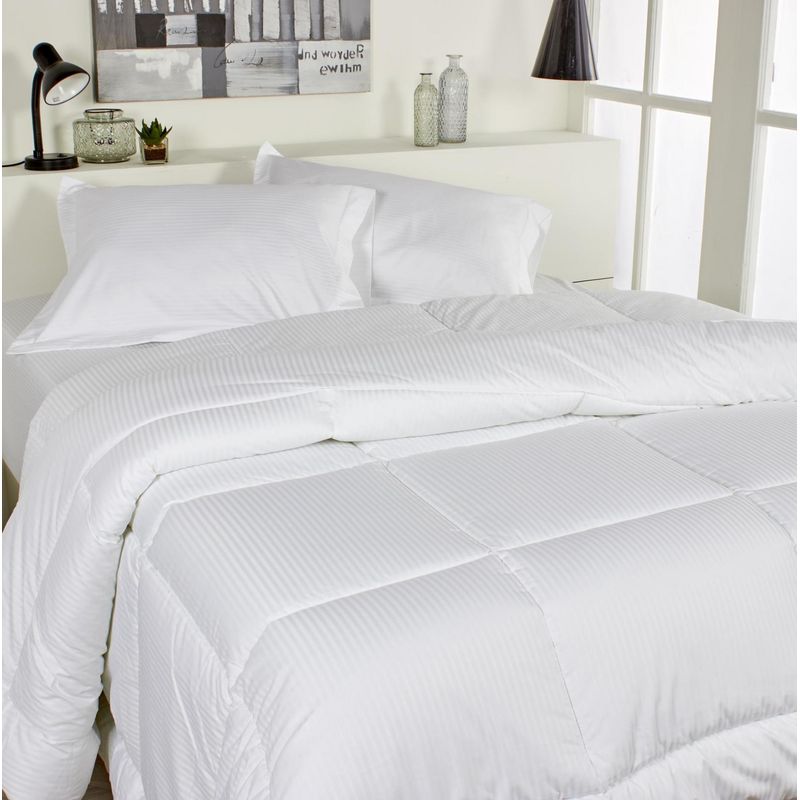 Model wearing women's burgundy red crewneck artwork tee with small white triangle overlapping larger black triangle.