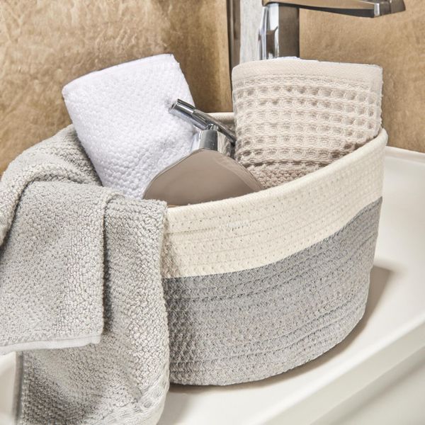 CANASTA-ORGANIZADORA-REDONDA-M-HUDSON-GRIS-NIEVE-BR
