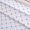 CUBRECAMA-BORDADO-REVER-EXTRADOBLE-JANOS-BLANCO-GRIS-NIEVE-7702997704062_2