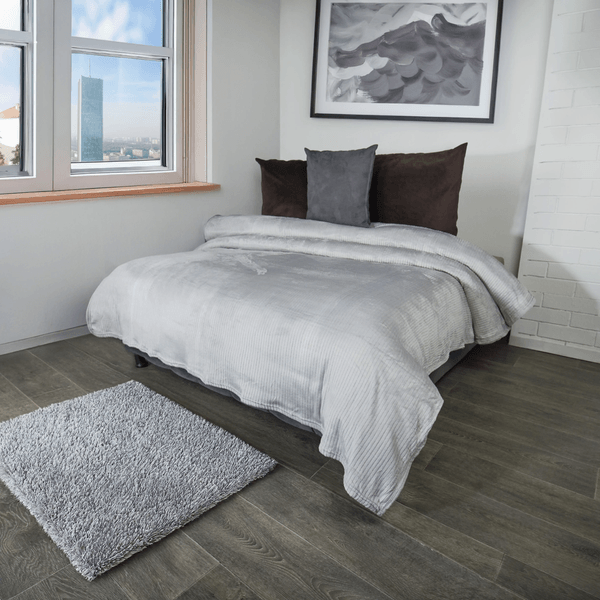 COBIJA-FLANNEL-JACQUARD-170X230-LINEAS-GRIS-NIEVE
